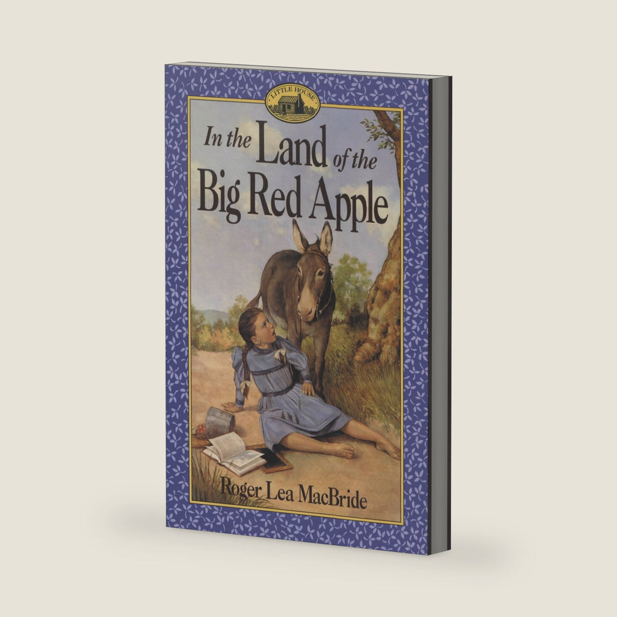 In the Land of the Big Red Apple: A Story of Rose Wilder's Christmas in Missouri for Children (Ages 8-12) (Little House Sequel, 3) by Roger Lea MacBride