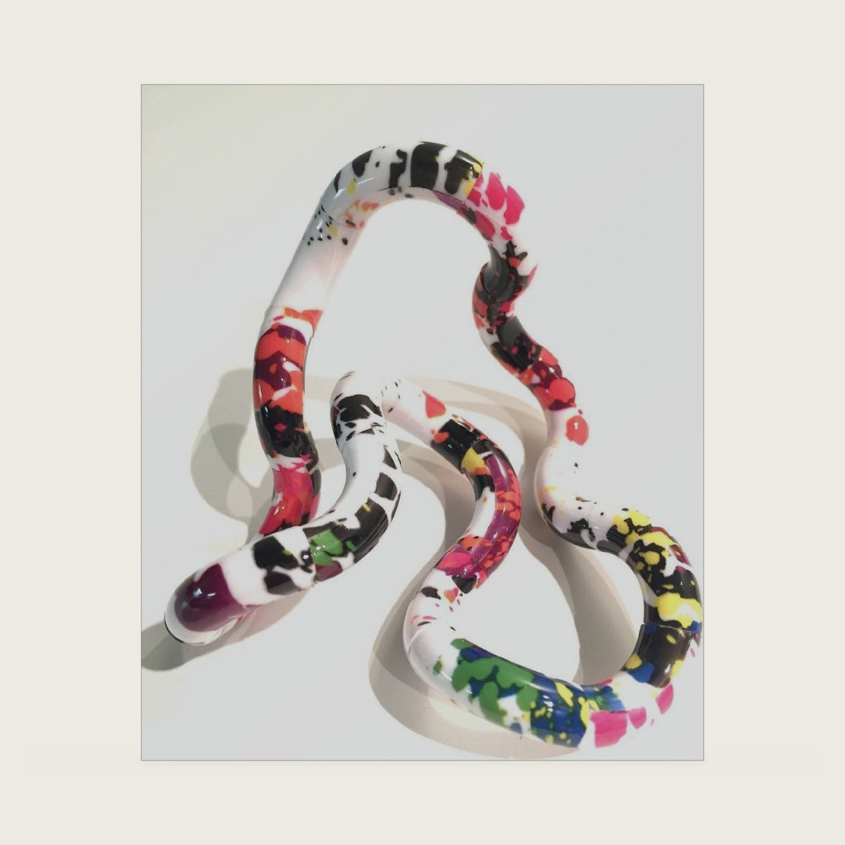 TANGLE Jr. Artist Collection Sensory Fidget Toy, Rainbow Splatter