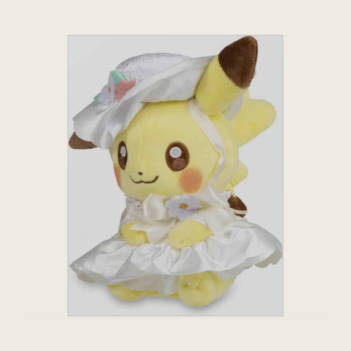 Center: Pikachu Happy Spring Poké Plush, 7 ¾ Inch