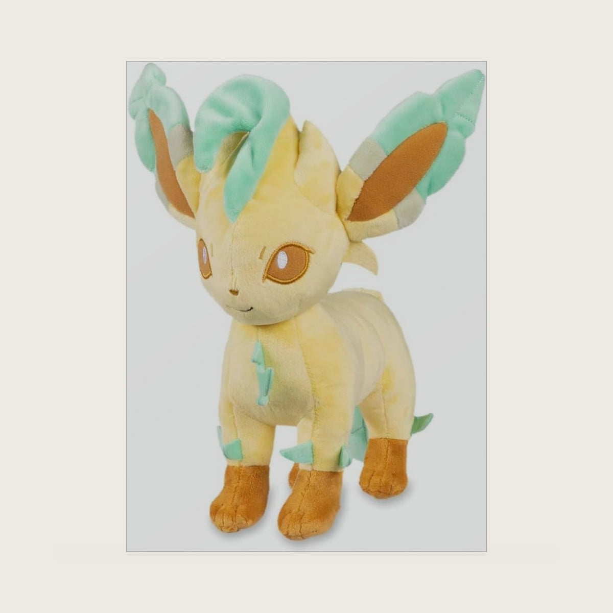 Center: Leafeon Poké Plush