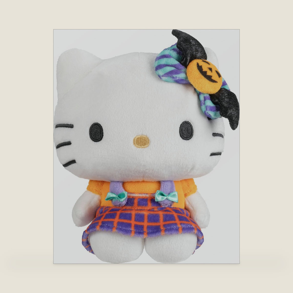 Jazwares ® and Friends, 8-Inch Halloween Plush with an Striped Bat Bow - Officially Licensed ® Product from Ages 6+