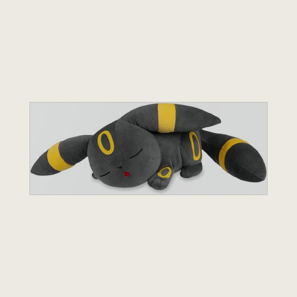 Center: Sleeping Umbreon Poké Plush