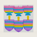The Dreidel Company Menorah & Dreidel Set Poppit, Pop Fidget Toy Dreidel Menorah Popper Set (Multicolor, 3-Sets)