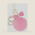 Keychain with Plush Ball Charm, Sparkling Pink Crystal Accents for Bag Decor and Stress Relief, Durable Metal Construction with Fade-Resistant Finish, Adorable Desktop Accessory for Daily Use
