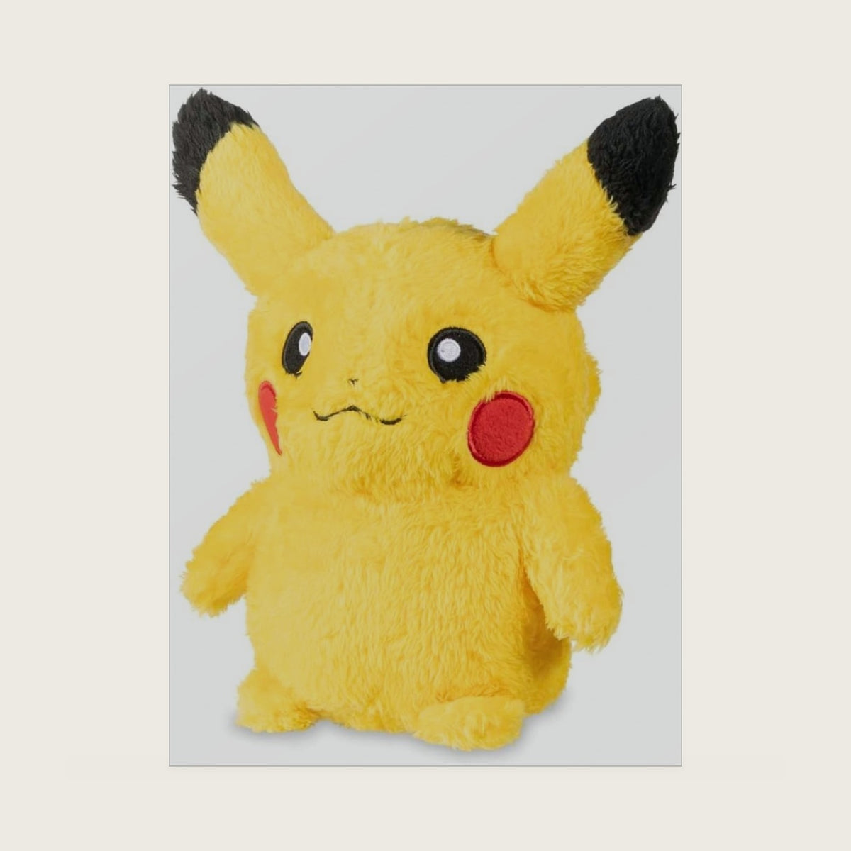 Center: Cuddly Pikachu Plush